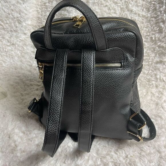 Steve Madden Black synthetic embossed small backpack gold tone hardwares. - Picture 16 of 16